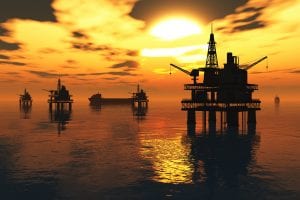 Oil Field Pumps Silhouettes in the Sunset