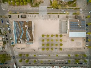 Aerial view of buildings with solar panels