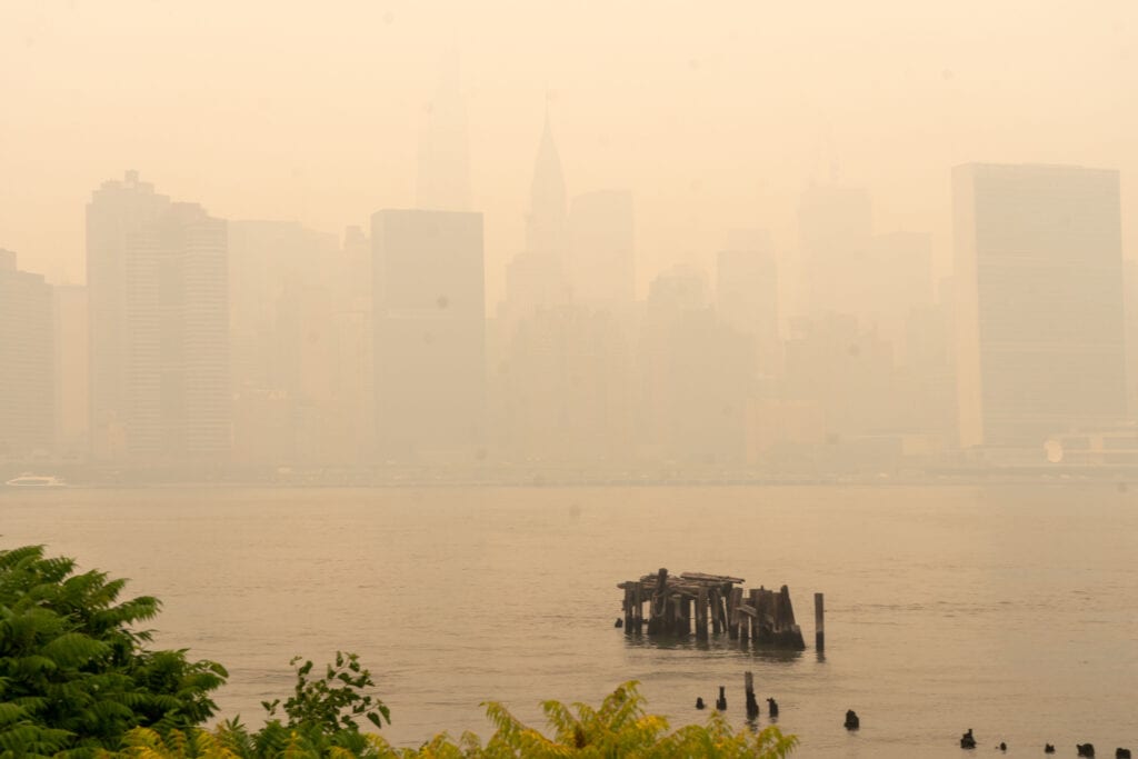 Smoke from Canadian wildfires blew south creating hazy conditions on large swath of US East Coast.