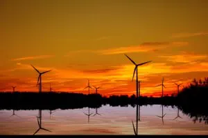 Sunset with wind turbines in the picture