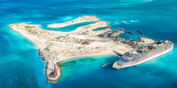 Aerial shot of the entire island of Ocean Cay MSC Marine Reserve, with a cruise ship docked in port