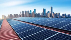 City skyline (Chongqing, China) with solar panels in the foreground